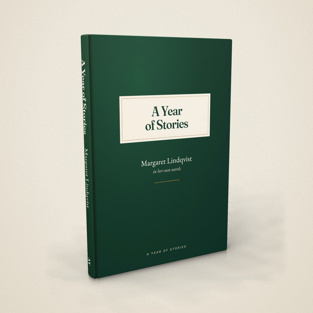 The finished hardcover: 6 by 9 inches, forest green, with the storyteller's name on the cover