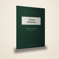 The finished hardcover: 6 by 9 inches, forest green, with the storyteller's name on the cover