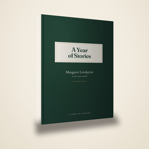 The finished hardcover: 6 by 9 inches, forest green, with the storyteller's name on the cover